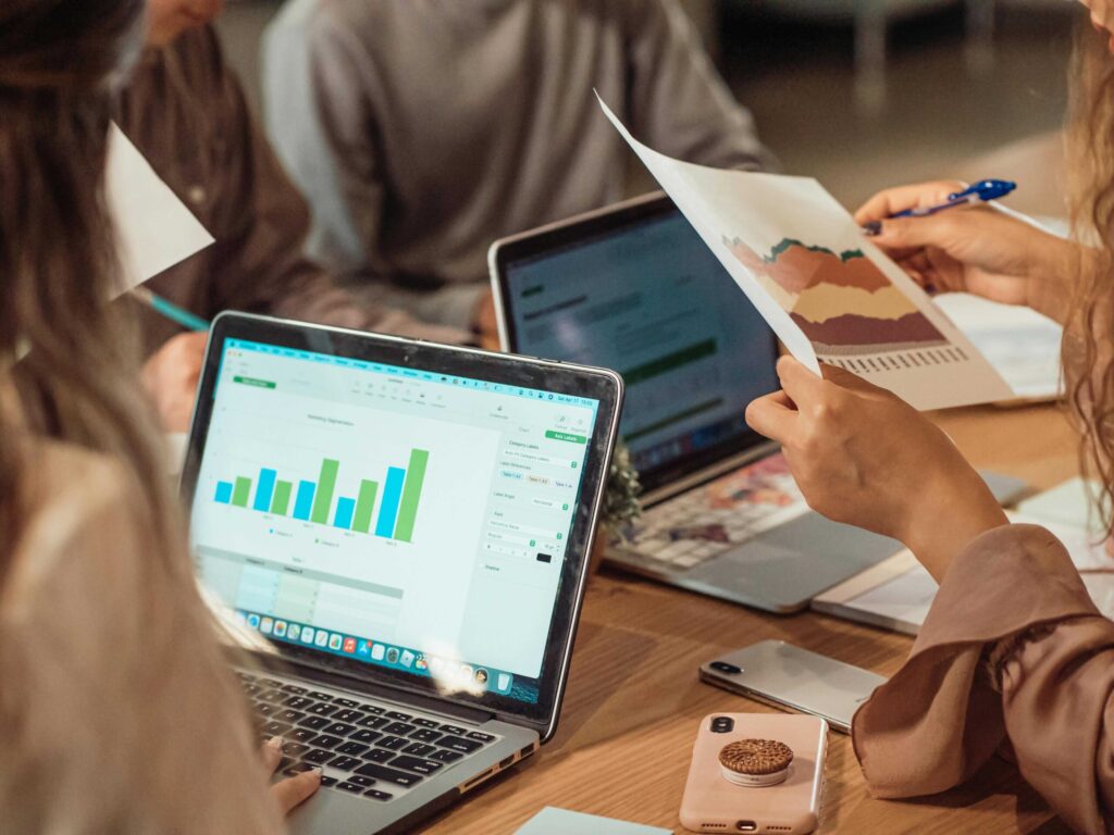 Business intelligence analysts working at a desk