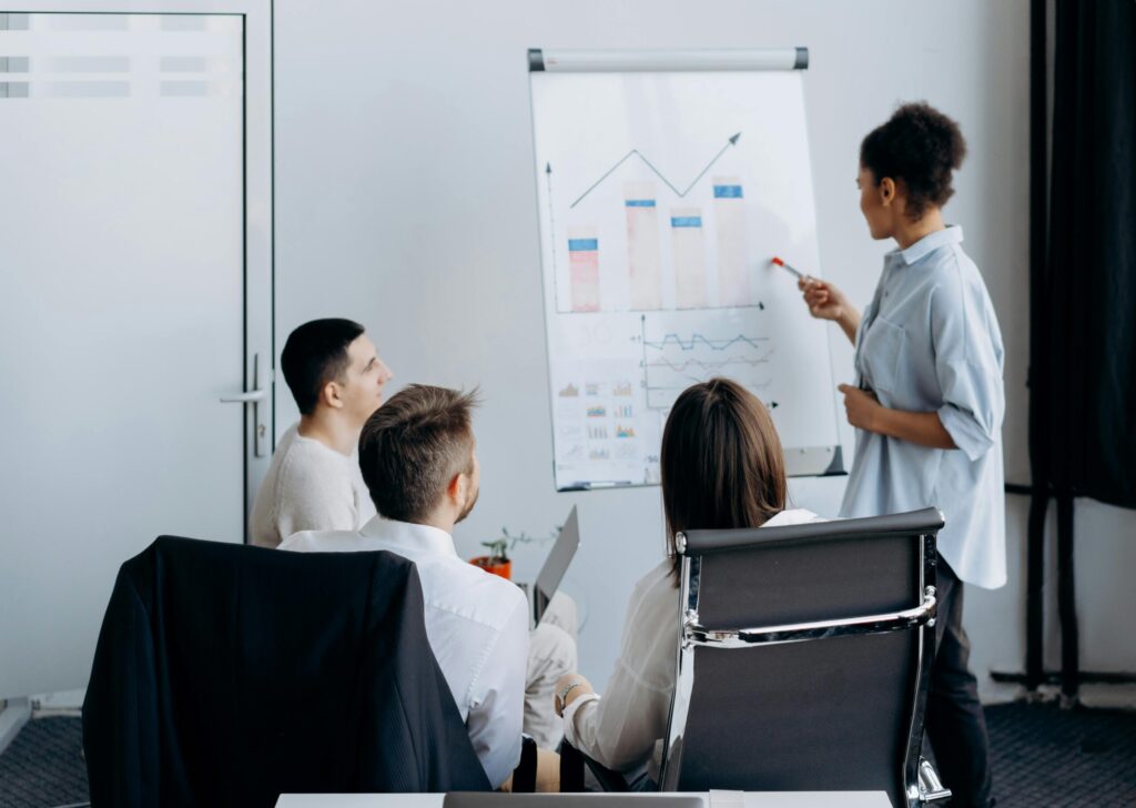 Group of data analysts working on a solution together.